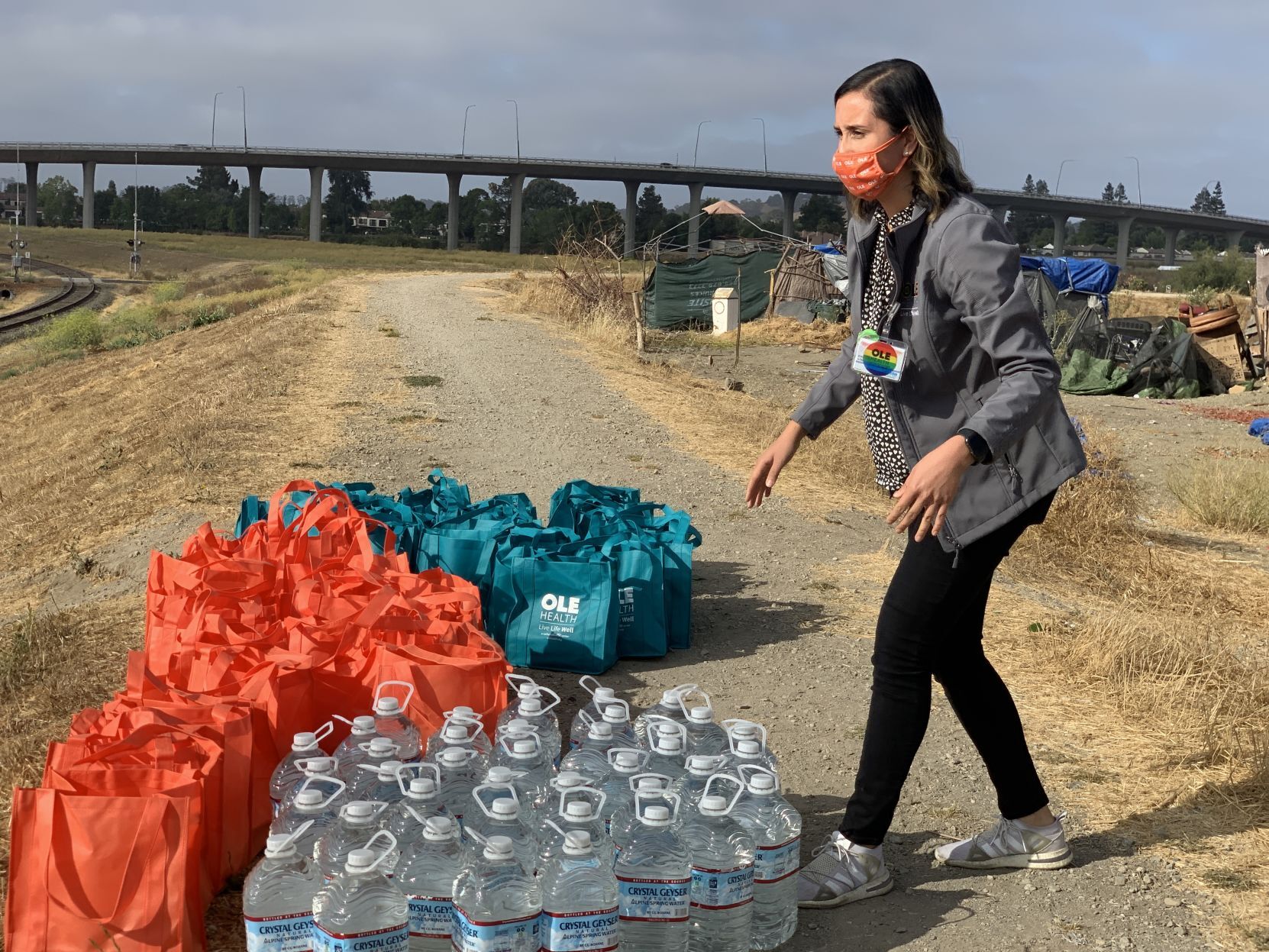 OLE Health distributes care bags to residents of the Bowl